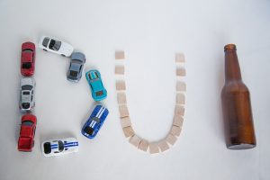 DUI spelled with objects that cause intoxication