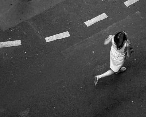 woman running on street
