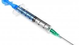 Medical syringe isolated on white