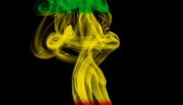 Smoke pillar colored in flag of reggae